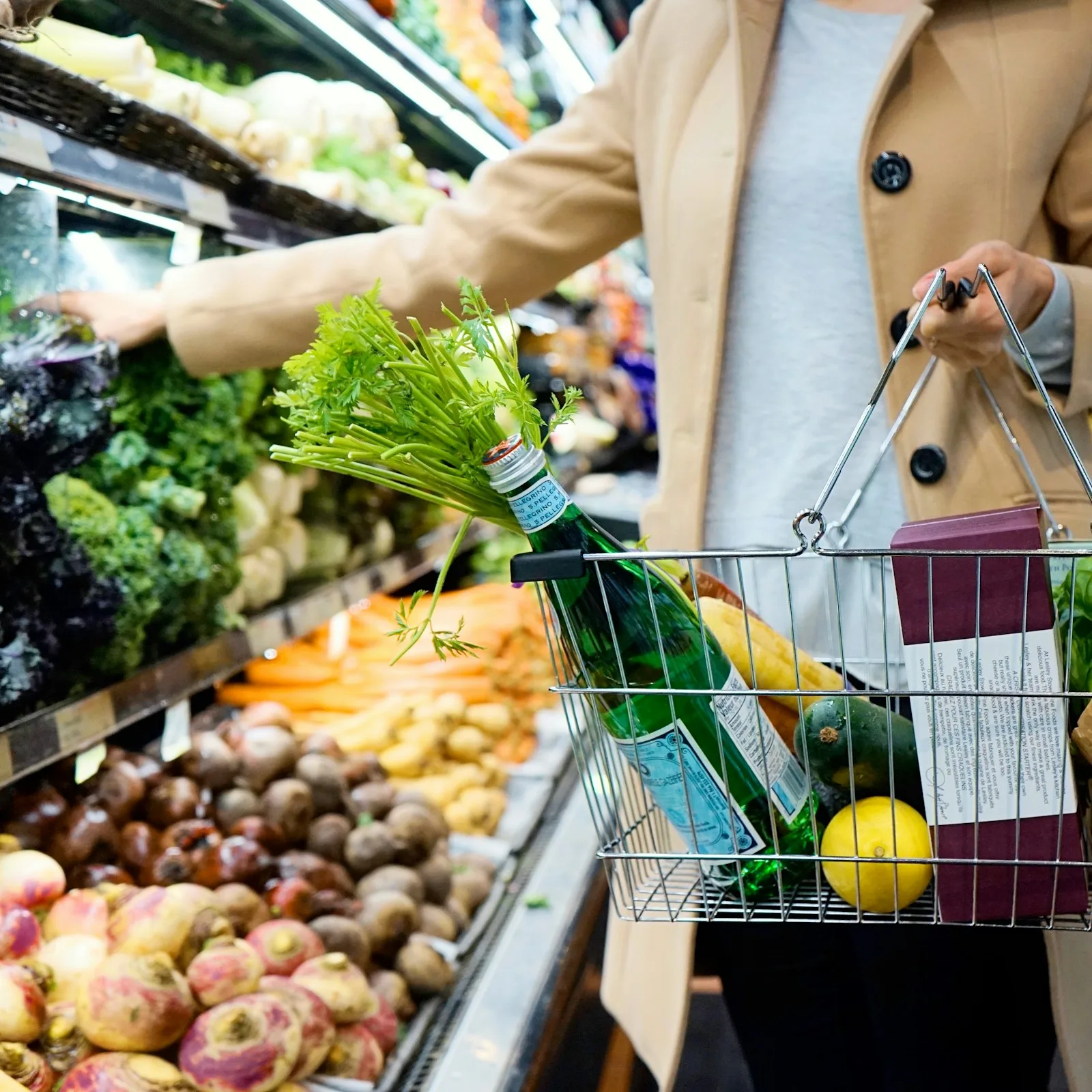 A woman purchasing grocery for her family at a supermarket