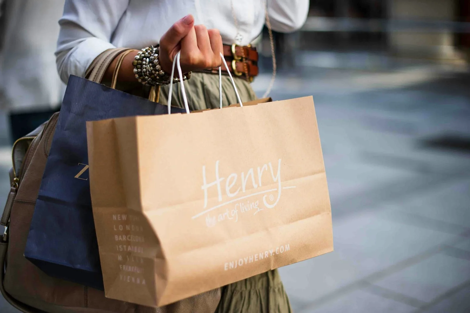 Photo of a person returning home post shopping.